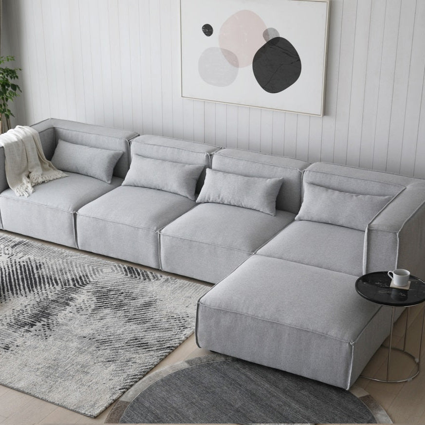 Sofá modular 4 plazas con 2 esquineros y 1 Puff Capri gris