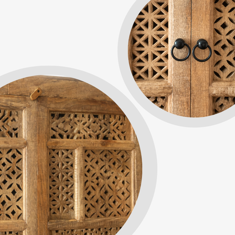 Detalle del tallado artesanal en madera maciza de mango del armario Aruna